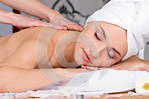 Beautiful woman in spa salon