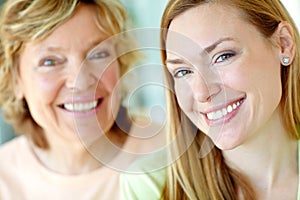 Beautiful woman spending time with her mother. A lovely mature woman enjoying some quality time with her mother.