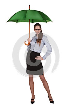 Beautiful woman standing under a big green umbrella
