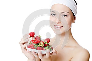 The beautiful woman with strawberry