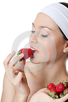 The beautiful woman with strawberry isolated