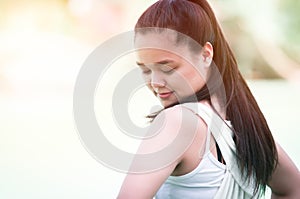 Beautiful woman stretching in the park