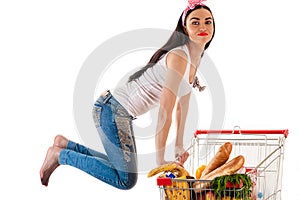 Beautiful woman with a supermarket trolley