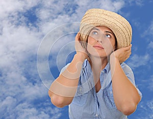 Beautiful woman surrounded by sky.