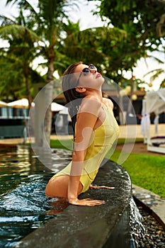 Beautiful Woman In Swimwear Relaxing In Swimming Pool. Summer Vacations