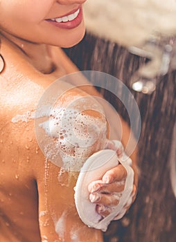 Beautiful woman taking shower