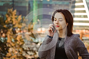 Beautiful woman talking on the mobile phone