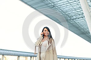 Beautiful Woman Talking On Phone Walking On Street. Portrait Of Stylish Smiling Business Woman In Fashionable Clothes Calling On M