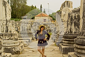 Beautiful woman in temple of apollon, Turkey