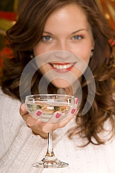 Beautiful woman toasting with champagne