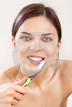 Beautiful woman with tooth-brush l