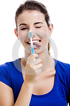 Beautiful woman with a toothbrush