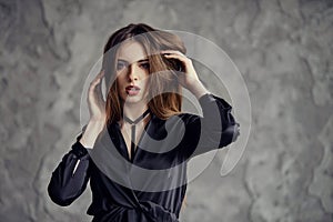 Beautiful woman touching her hair