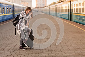 Beautiful woman at the train station photo