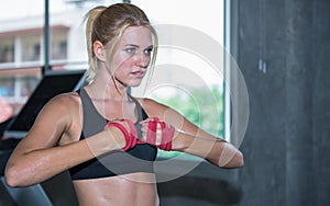 A beautiful woman training with resistance band