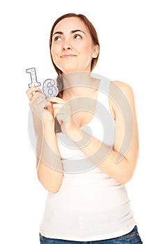 Beautiful woman with two candles on the white background