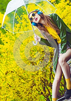 Beautiful woman under umbrella