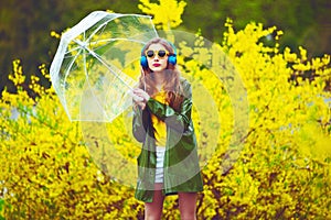 Beautiful woman under umbrella