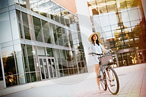 Beautiful woman using bike