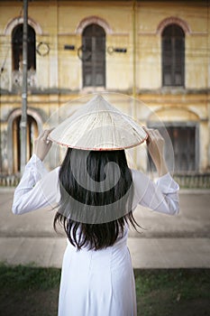 Beautiful woman with Vietnam culture traditional dress, Ao dai