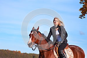 Beautiful woman walking with horse