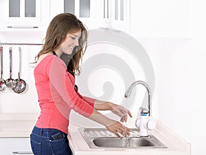 Beautiful woman washing hand