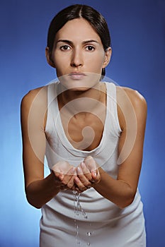 Beautiful woman washing her face