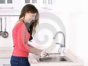 Beautiful woman washing strawberry