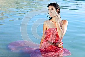 Beautiful woman in water