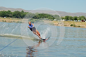 Beautiful woman waterskiing