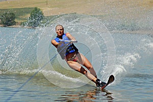 Beautiful woman waterskiing