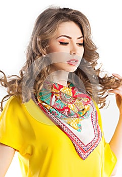 Beautiful woman wearing an colorful scarve photo