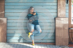 Plus size woman walking on the city street photo