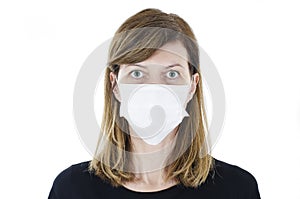Beautiful woman wearing medical face mask because of air, isolated on white background, copy space.