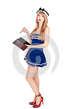Beautiful woman wearing sailor striped dress