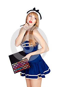 Beautiful woman wearing sailor striped dress