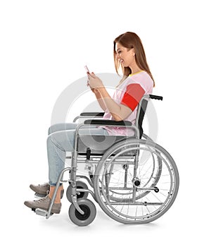 Beautiful woman in wheelchair using mobile phone isolated