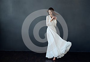 beautiful woman from white dress dance glamor performed elegant style