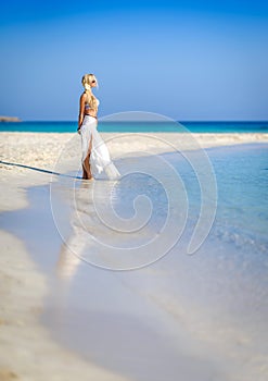 Beautiful woman in white,Nissi beach,ayia napa cyprus 2