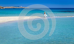 Beautiful woman in white,Nissi beach,ayia napa cyprus