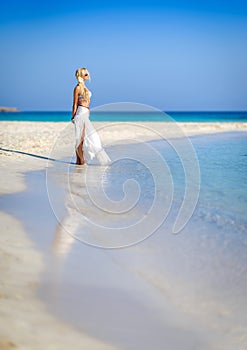 Beautiful woman in white,Nissi beach,ayia napa cyprus 2 photo