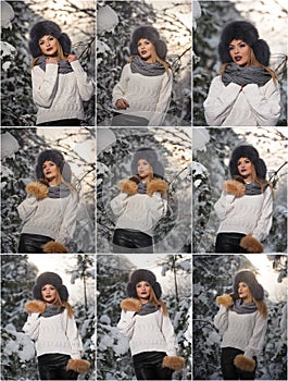 Beautiful woman in white pullover with over-sized fur cap enjoying the winter scenery in forest. Blonde girl posing