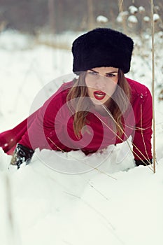 Beautiful woman in winter field