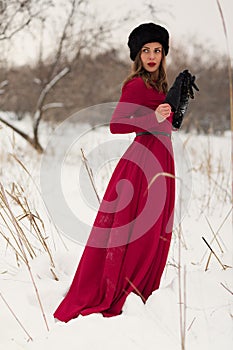 Beautiful woman in winter field