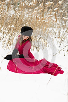 Beautiful woman in winter field