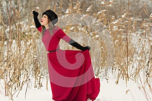 Beautiful woman in winter field