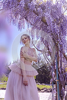 Beautiful woman in wisteria photoshoot portrait background beauty portrait photoshoot