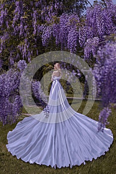 Beautiful woman in wisteria photoshoot portrait background beauty portrait photoshoot