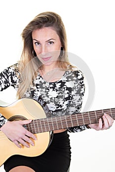 Beautiful woman with wood acoustic guitar classic on white background