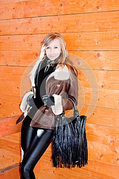 Beautiful woman in a wooden arbour